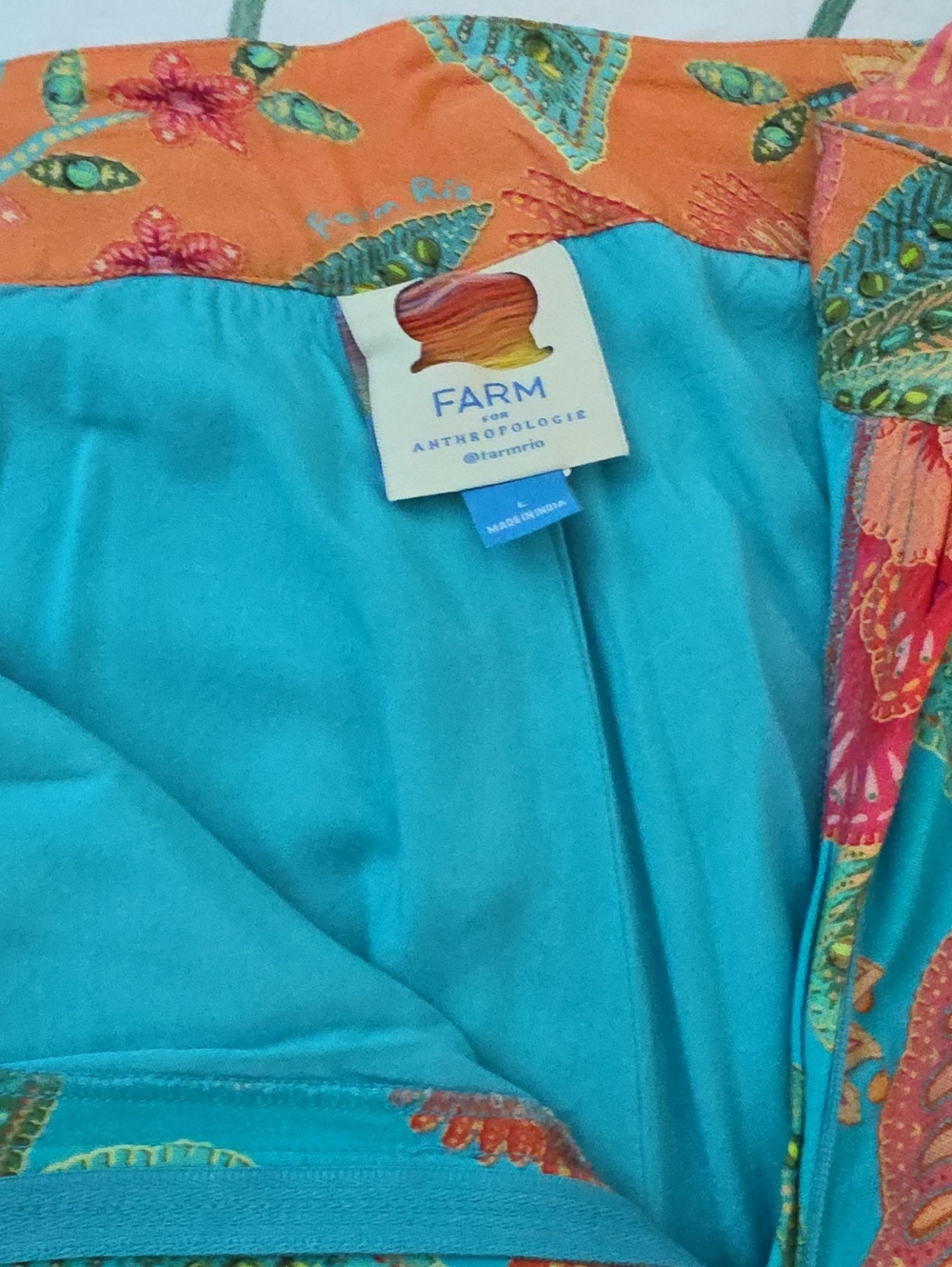 Anthropologie Turquoise Shorts with Orange Floral Waistband